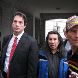 Glenn Stoddard, Art “Little Big Man” Sheggone, and drummer Sam Morris outside the capitol.