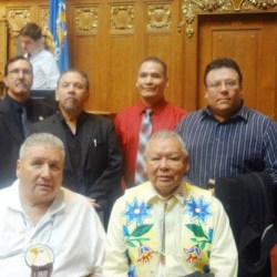 Leaders of the Wisconsin Indian Tribes. From Left: Left is Stewart Bearhart, (St. Croix) Bob Chicks, (Stockbridge-Munsee) Ed Delgago, (Oneida) Craig Corn, (Menominee) Mike Wiggins, (Bad River Ojibwe) Mic Isham, (Great Lake Indian Fish and Wildlife Commission) front is Tom Maulson (Lac du Flambeau) and Harold "Gus" Frank, (Forest County Potawatomi)