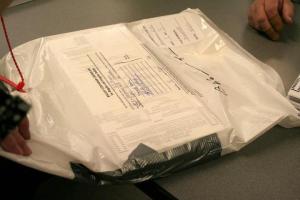 One of the 2 infamous duct taped ballot bags from Menomonee Falls in Waukesha County. After inspection these bags were found to be sliced open under the tape. They were also improperly secured --"winged" -- with 6" open ends each side of the zip-tie.