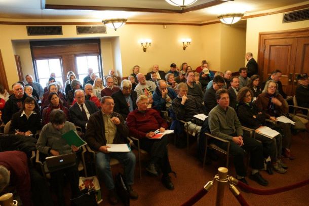 A packed house observes and waits to give testimony at the public hearing for AB1/SB1 on 1/23/13.