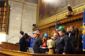 Walker invited hard hat wearing folks from northern Wisconsin to join him at the podium during his State of the State address promoting a new mining deregulation bill.