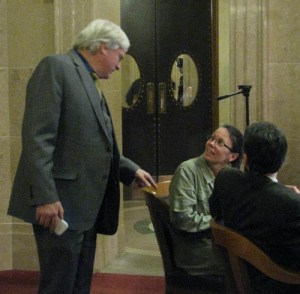 Sen. Glenn Grothmann takes time out from the mining debate to instruct journalist Rebecca Kemble on the mining bill. 