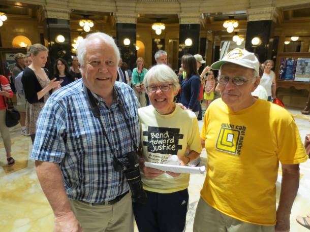 WI Sen Bob Jauch, Joan and Tom Kemble after the Kembles were arrested for singing in the WI Capitol. Photo: Leslie Amsterdam