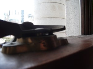 Headless screws driven into window hardware at the Capitol to prevent access during lockdown.