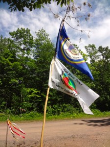 Lac Courte Oreilles and Bad River Bands of Lake Superior Chippewa sovereign flags.