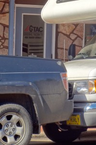 Vehicles blocking the sidewalk in front of GTac offices in downtown Hurley.