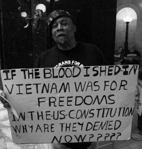 Will Williams, longtime Madison peace activist and frequent noon hour singer at WI Capitol 7.31.13. Photo by Leslie Amsterdam