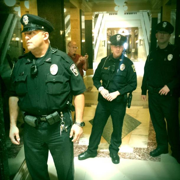 Officer Syphard and two new hires. Photo by Craig Spaulding