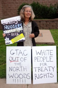 LCO Harvest Camp supporter outside of the Iron County Board meeting on July 30, 2013. Photo by Rebecca Kemble