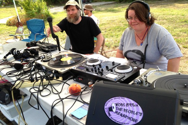 WORT station manager Norman Stockwell and DJ Bad Sister Heidi staffing the remote radio station. Photo by Rebecca Kemble