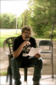 Rob Ganson reads his speech to the Sawyer County Dems gathering. Photo courtesy of Greg Jennings