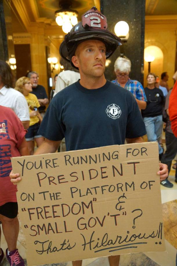 August 19, 2013 Madison firefighter Teddy Higgins immediately before his arrest for singing without a permit.