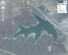 Sulfuric acid holding pond at Cobre Las Cruces. Google Earth.