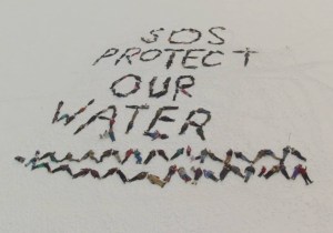 SOS Protect Our Water from Bodies on the Ice 3.9.14 Credit: David Doering, SunRidge Moving Pictures, LLC.