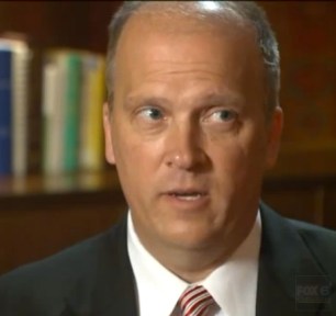 Brad Schimel looking towards the door during an interview with Fox News 6. Schimel refused to answers questions about his failure to investigate Joe Kleefisch. 