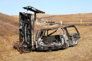 The remains of a car and solar panel remain on site after Morton County law enforcement assaulted and decimated the North Treaty Camp on October 27, 2016, arresting hundreds and permanently blocking the only direct route from CannonBall ND to Mandan/Bismark, and the closest hospitals.
